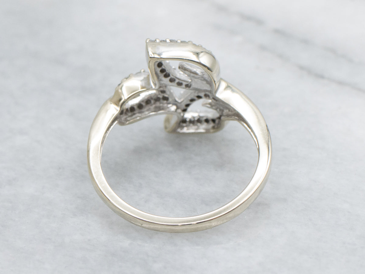 Modern White Gold Diamond-Encrusted Leaf Wrap Ring