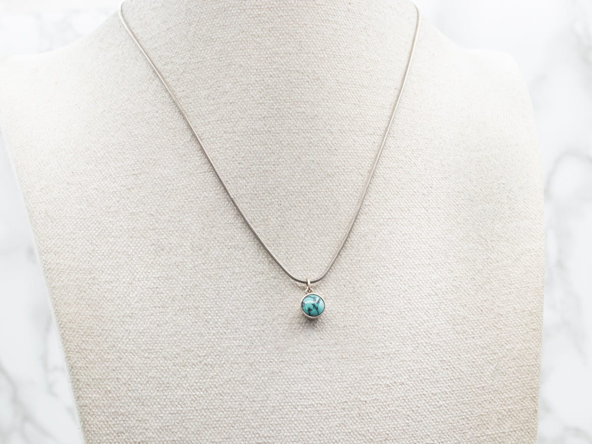 Simple Gold Bezel-Set Turquoise Pendant