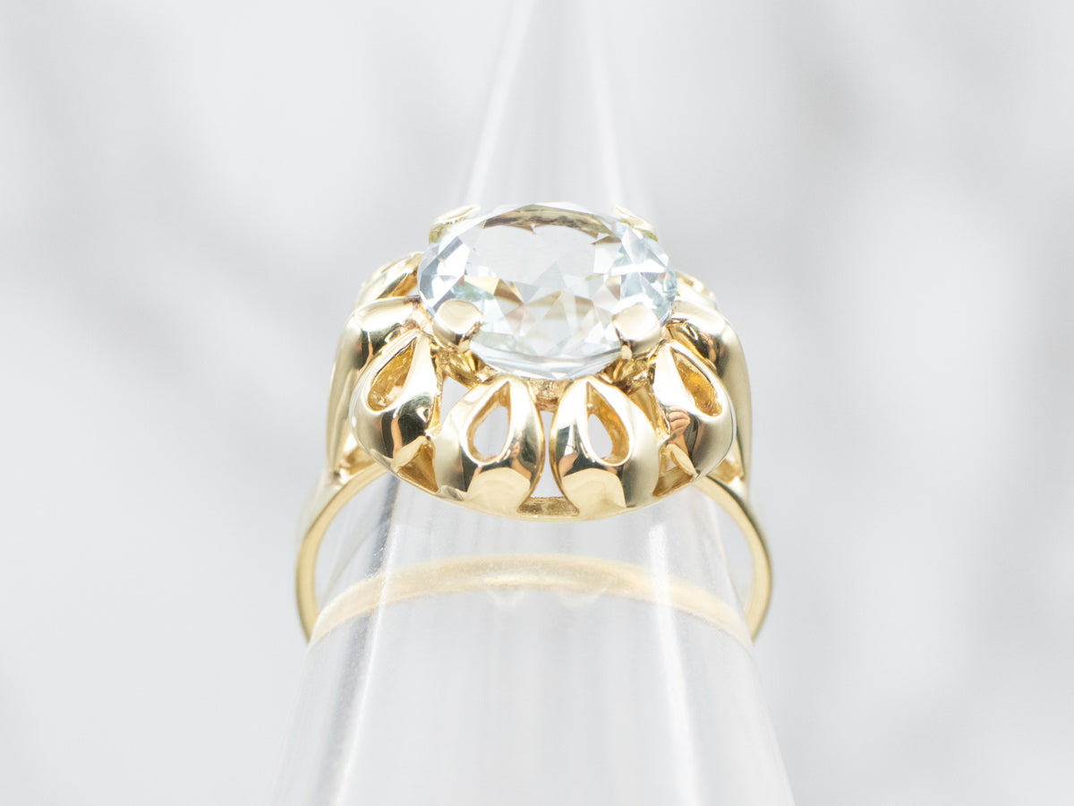 Looping Gold Aquamarine Solitaire Ring
