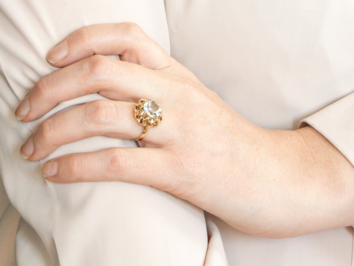 Looping Gold Aquamarine Solitaire Ring