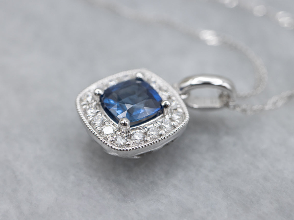 Cushion-Cut Sapphire and Diamond Halo Pendant. Necklace