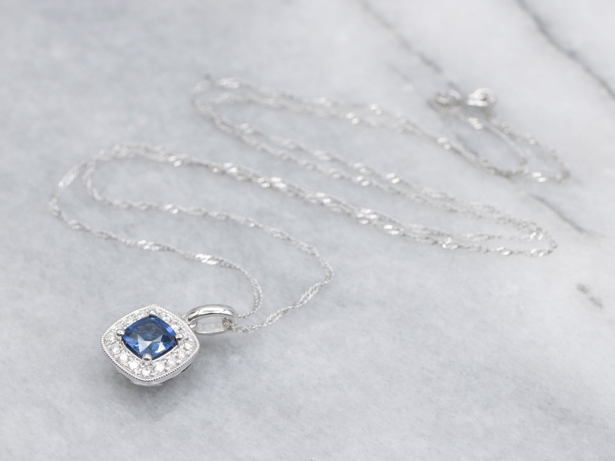 Cushion-Cut Sapphire and Diamond Halo Pendant. Necklace