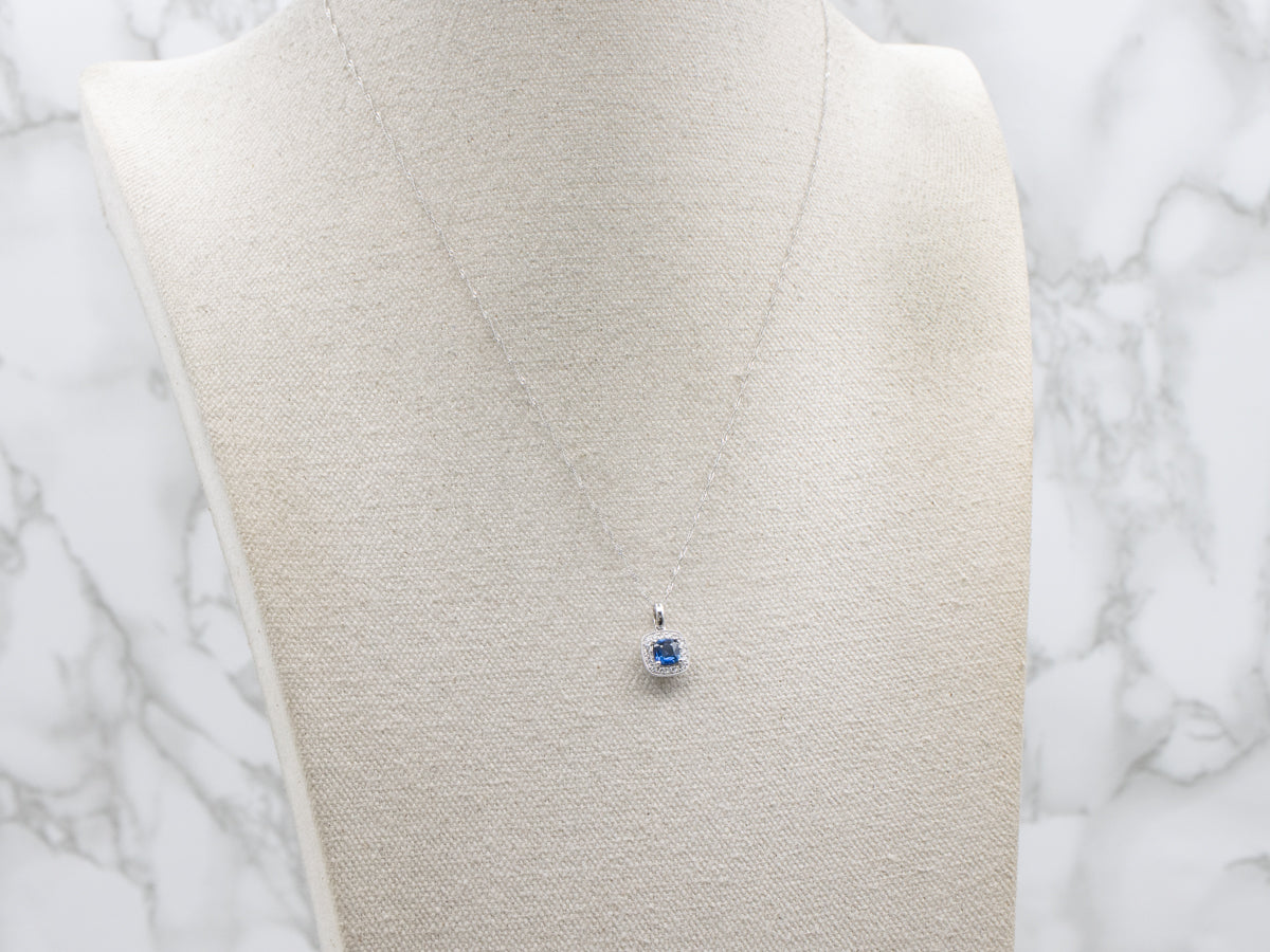 Cushion-Cut Sapphire and Diamond Halo Pendant. Necklace