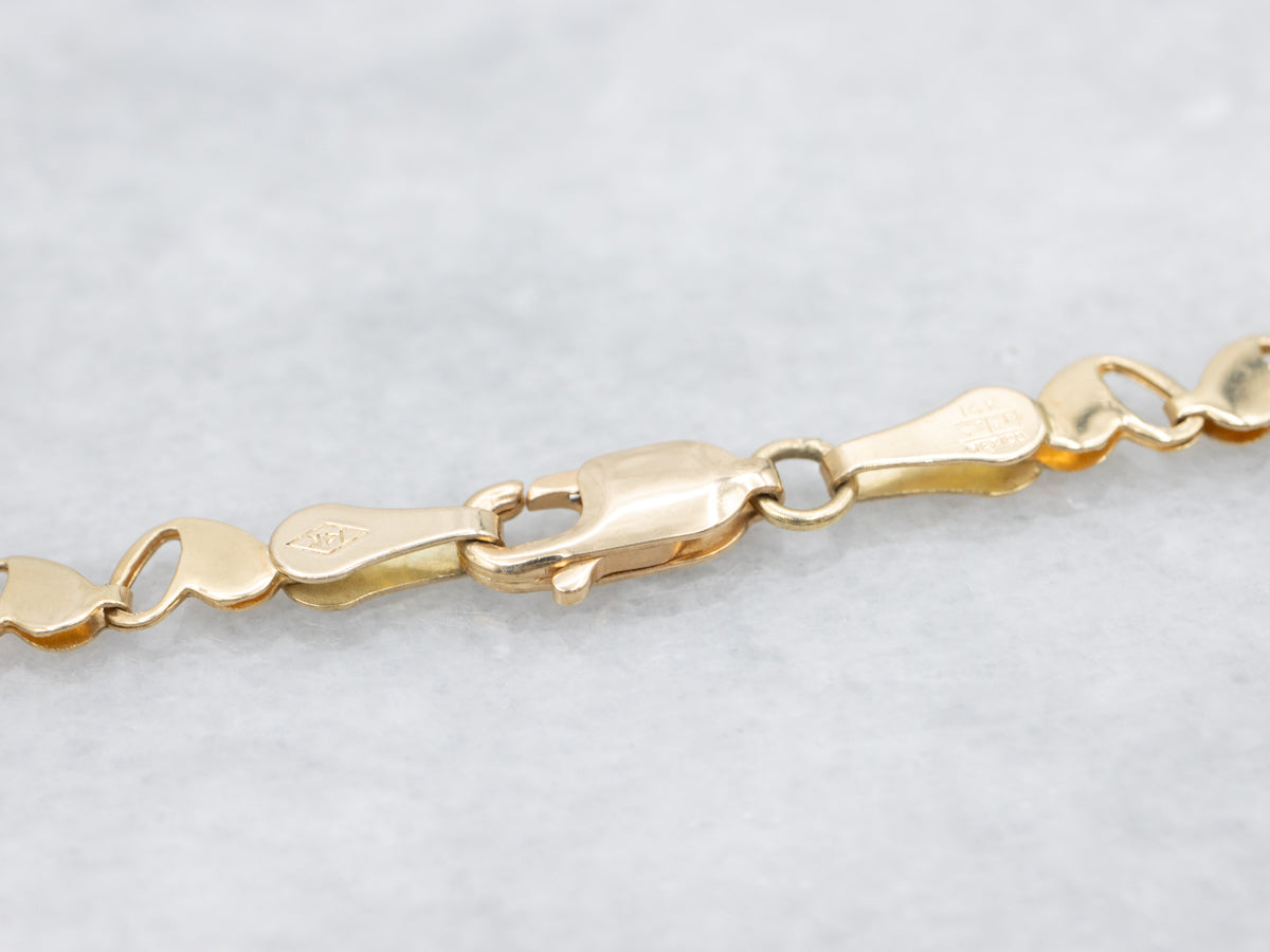 Sweetheart Blue Topaz and Gold Gemstone Necklace