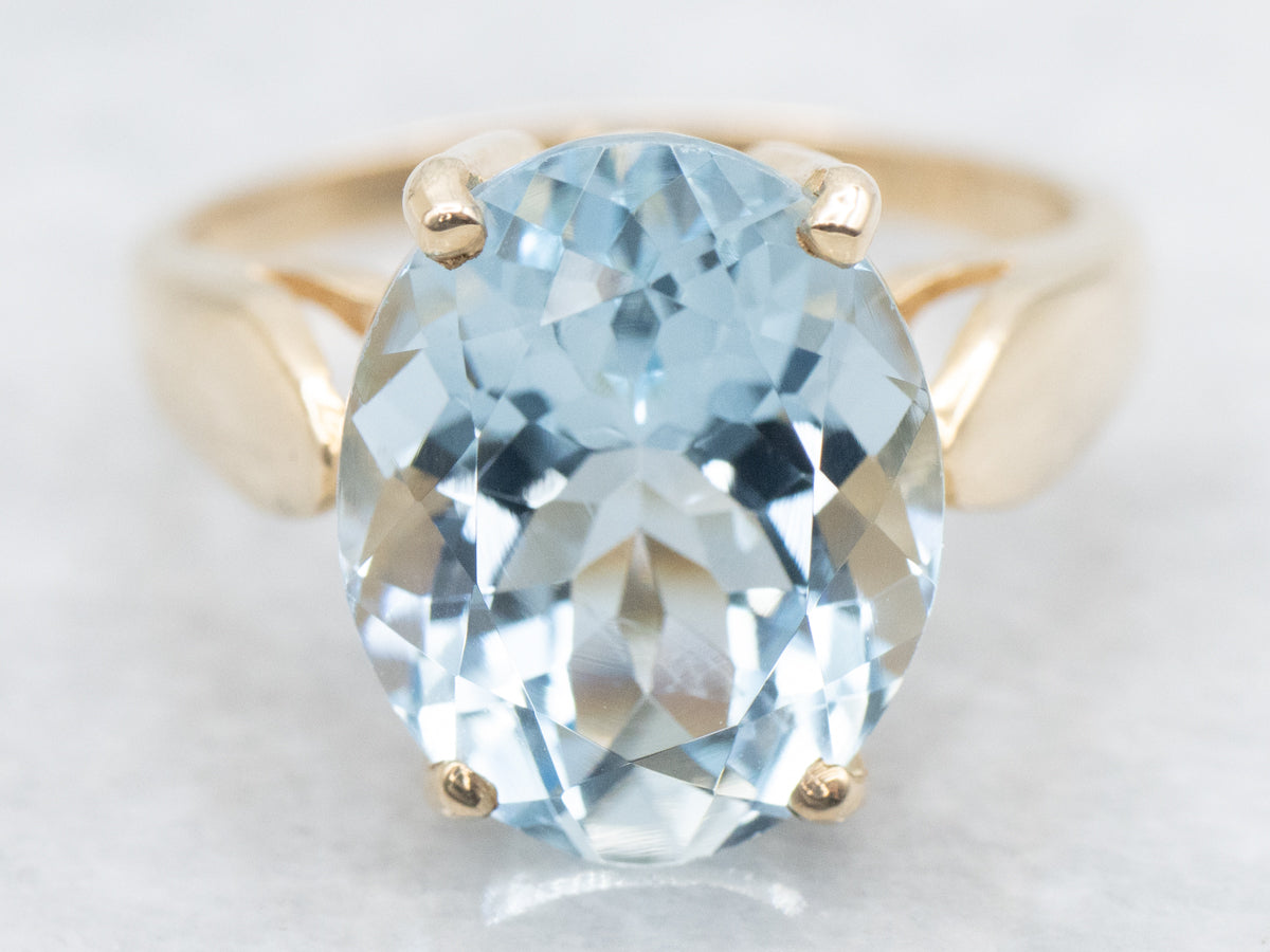 Sweet Gold Oval Cut Aquamarine Solitaire Ring