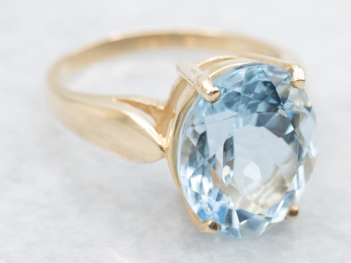 Sweet Gold Oval Cut Aquamarine Solitaire Ring