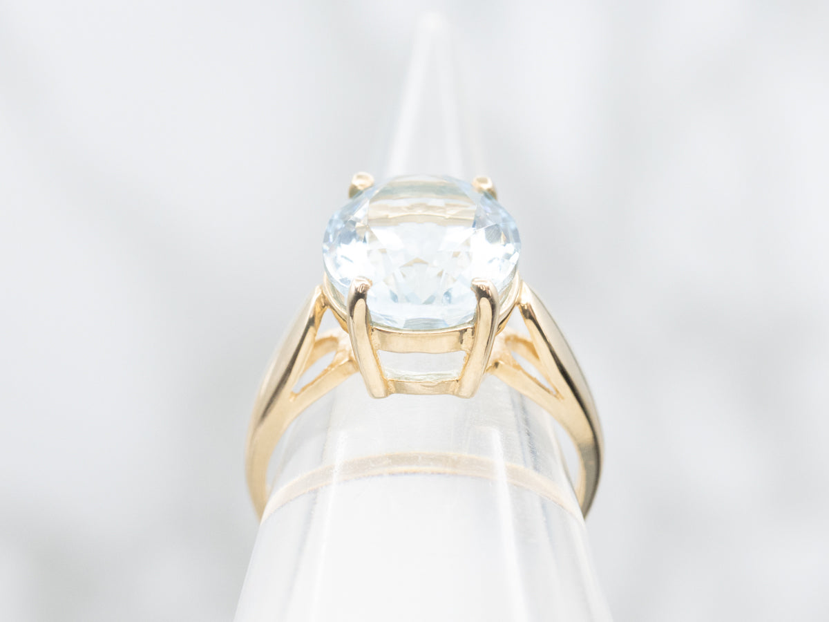 Sweet Gold Oval Cut Aquamarine Solitaire Ring