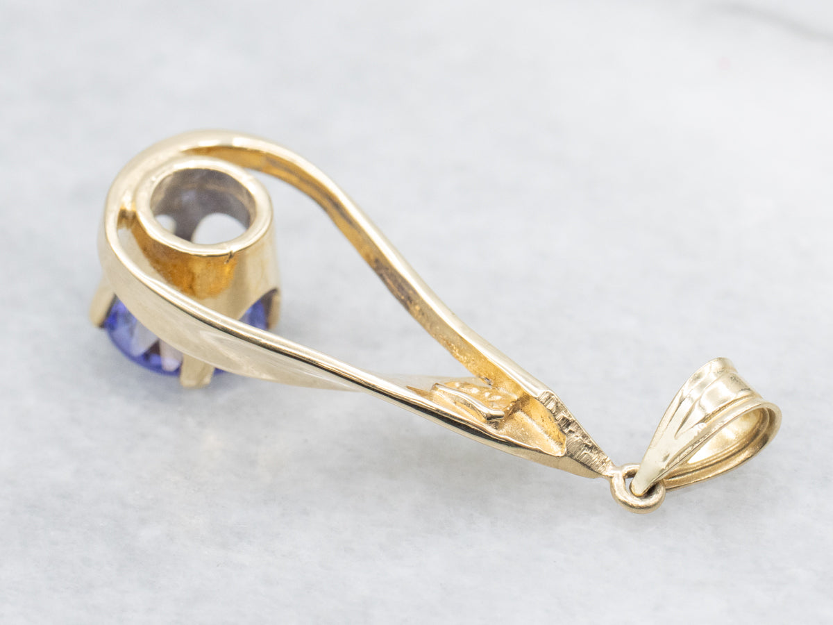 Twisting Gold Teardrop Tanzanite Solitaire Pendant