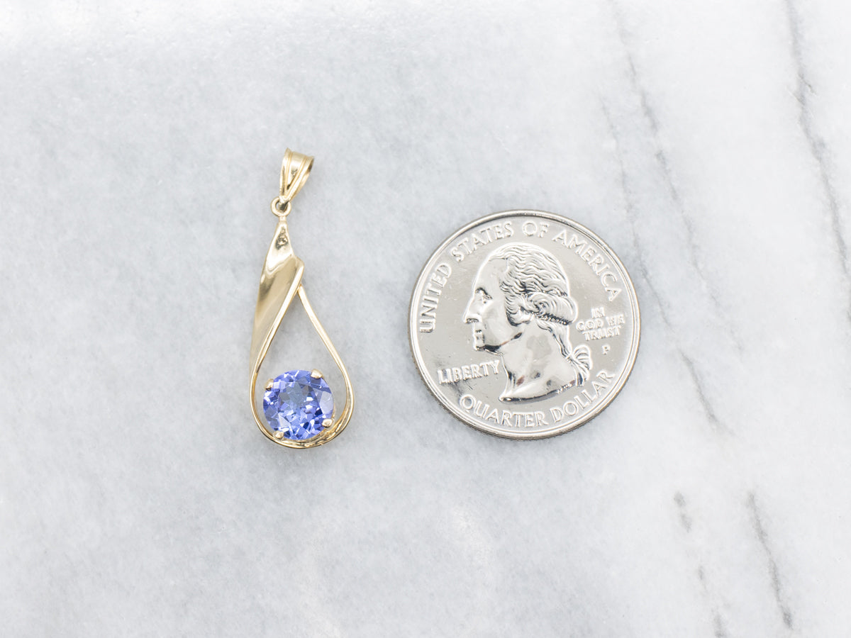 Twisting Gold Teardrop Tanzanite Solitaire Pendant