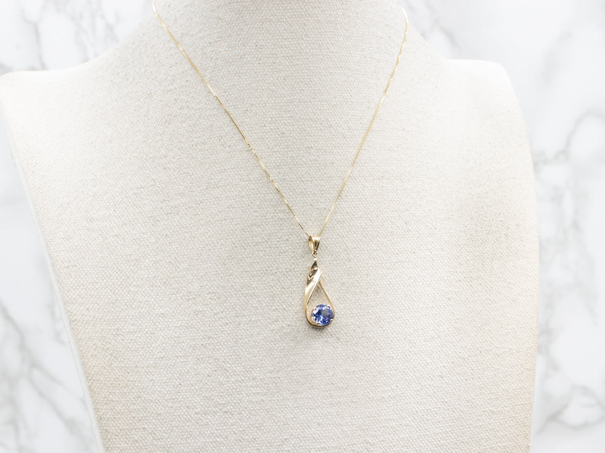 Twisting Gold Teardrop Tanzanite Solitaire Pendant