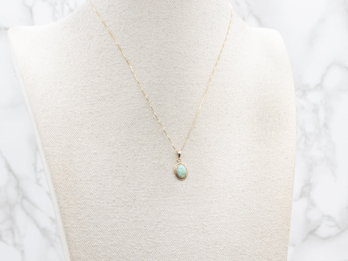 Gold Boulder Opal Pendant with Jump Ring Bail