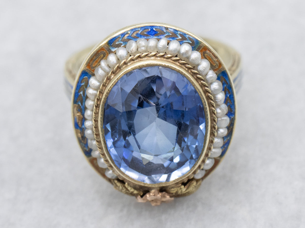 Art Nouveau Era Synthetic Sapphire with Seed Pearl Halo and Blue Enamel Ring