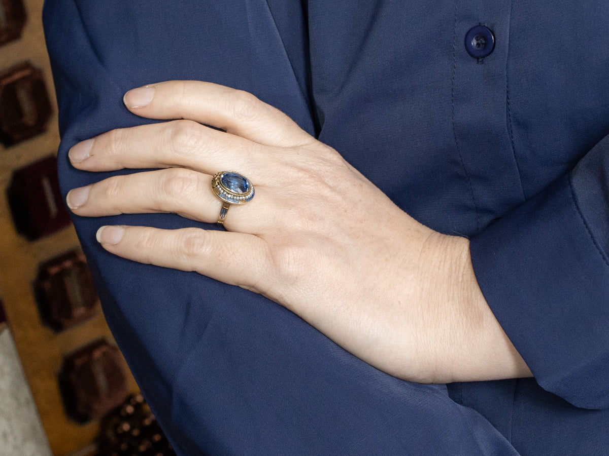 Art Nouveau Era Synthetic Sapphire with Seed Pearl Halo and Blue Enamel Ring