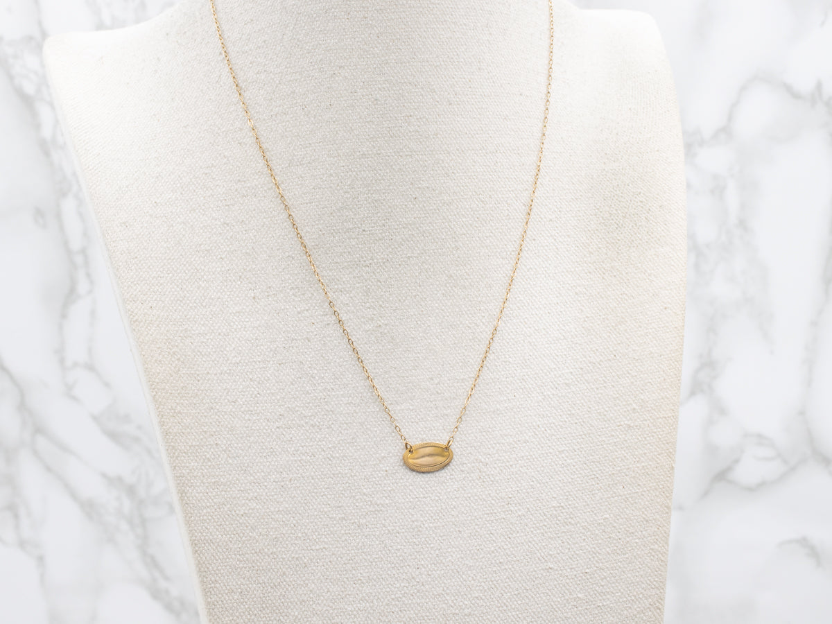 Gold East-to-West Disc Necklace with Engraved Border