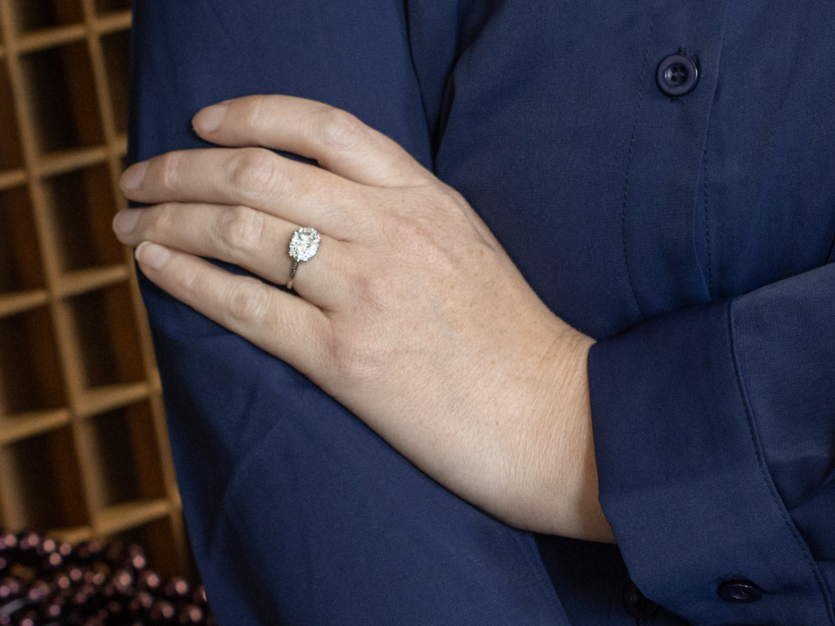 Antique Platinum Halo Ring with Old European and Mine Cut Diamonds