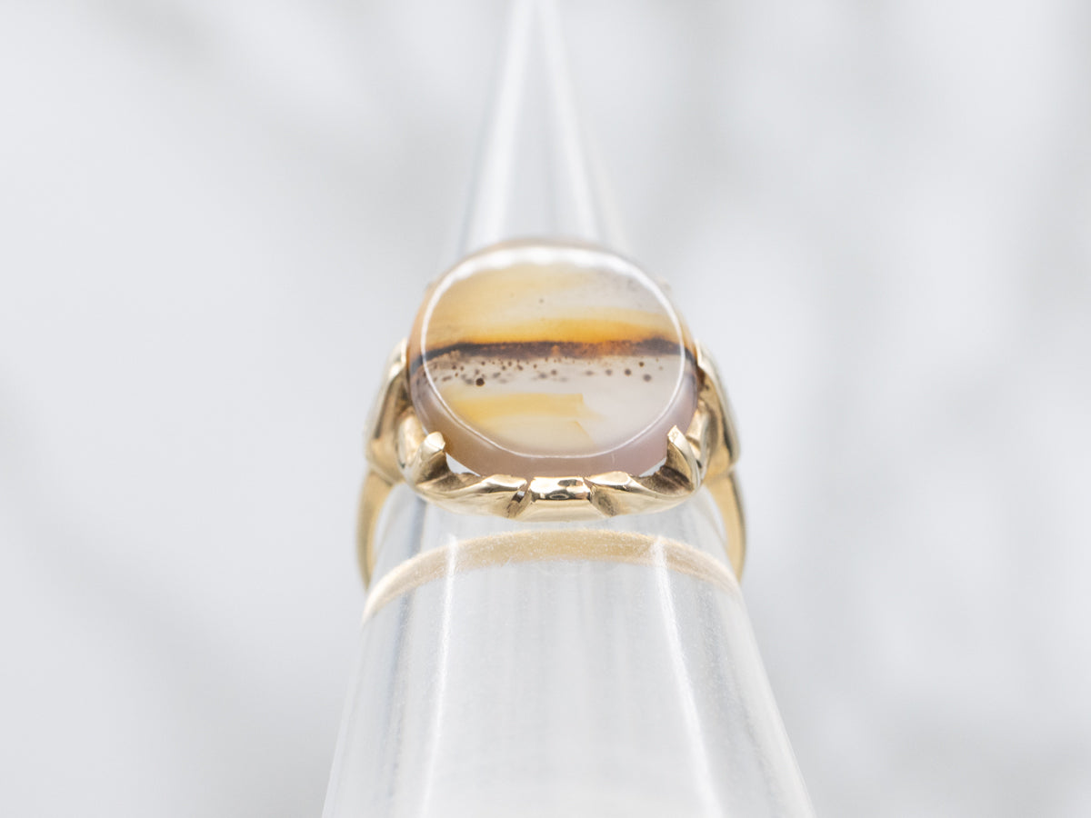 Anillo solitario de oro amarillo con ágata Montana