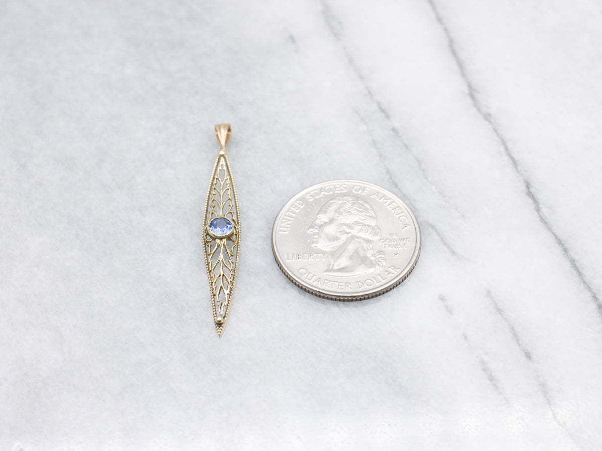 Beautiful Filigree Pendant with Round Sapphire Center
