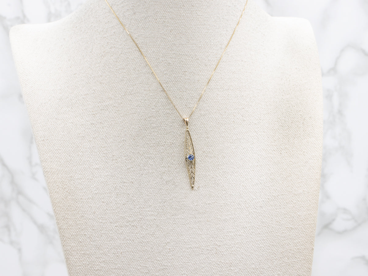 Beautiful Filigree Pendant with Round Sapphire Center