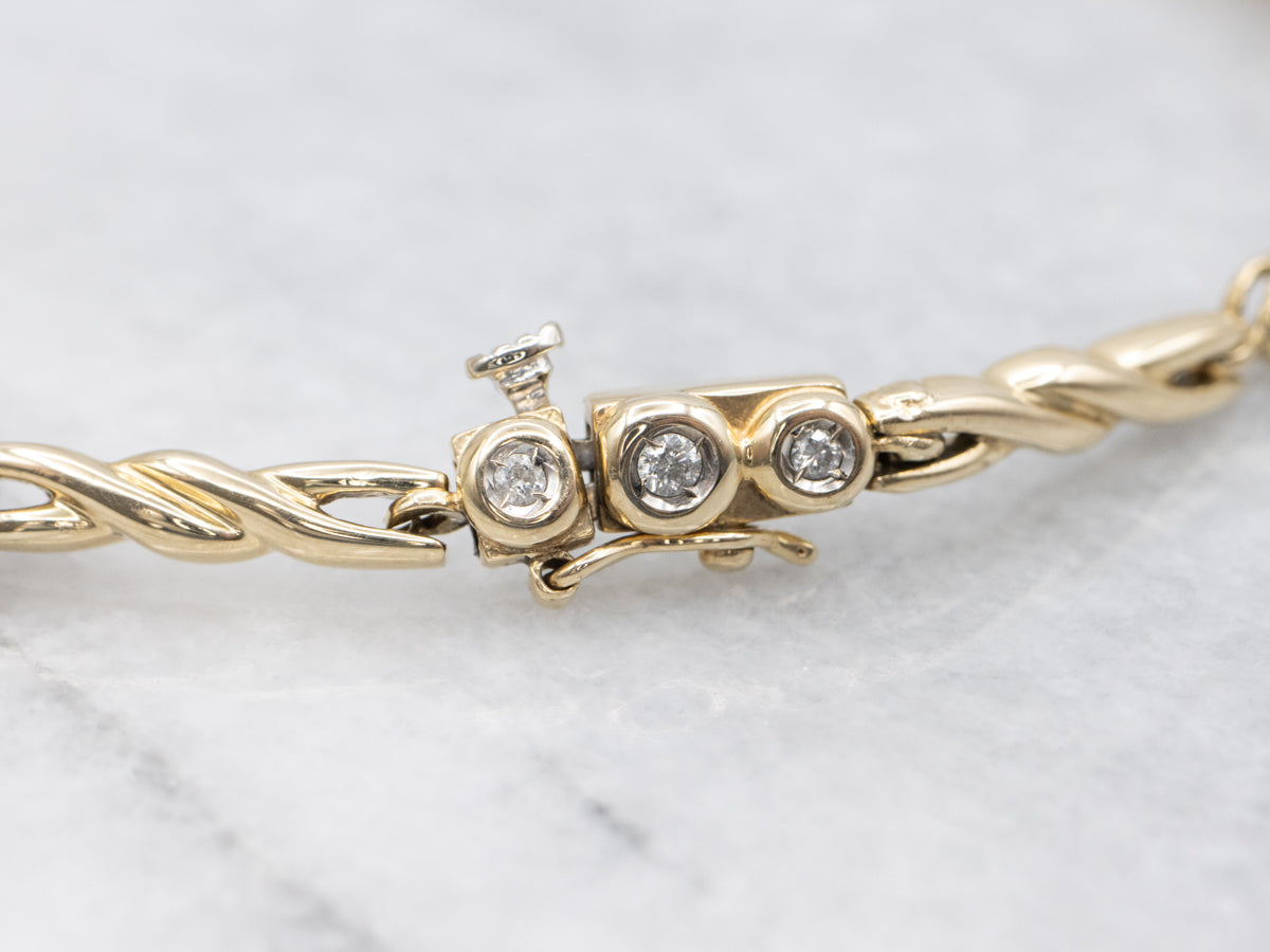 Twisting Gold Bezel Set Diamond Link Bracelet