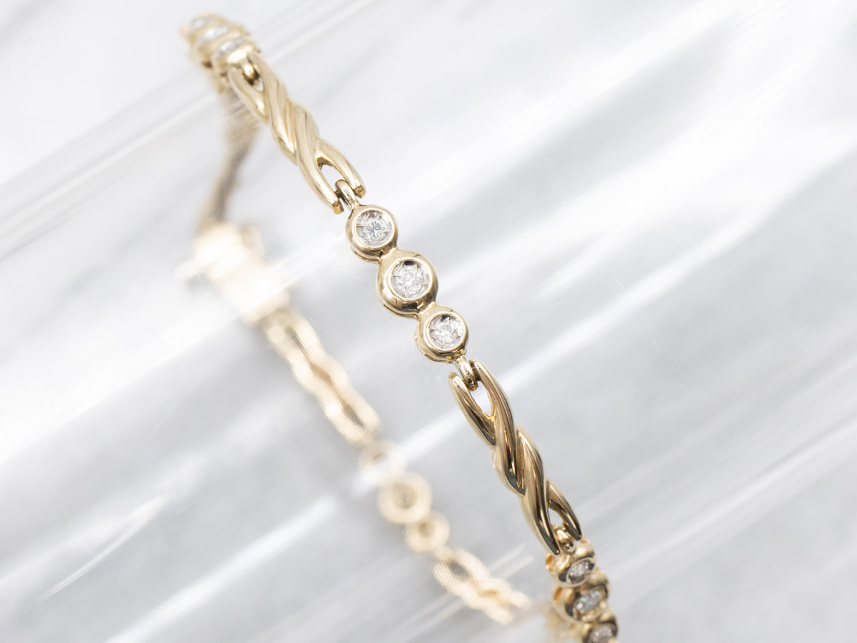 Twisting Gold Bezel Set Diamond Link Bracelet