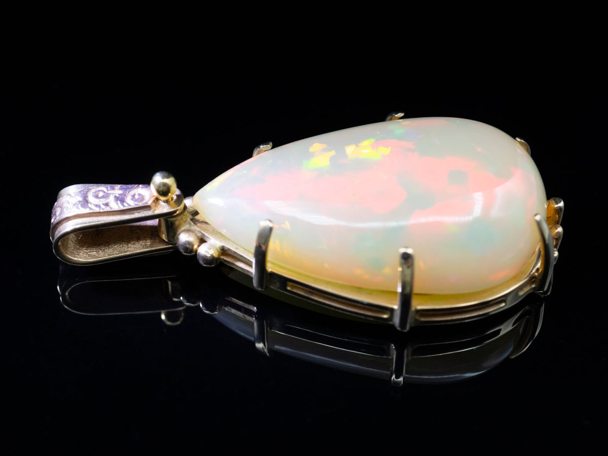 Huge Ethiopian Opal Pendant with Decorative Upcycled Bail