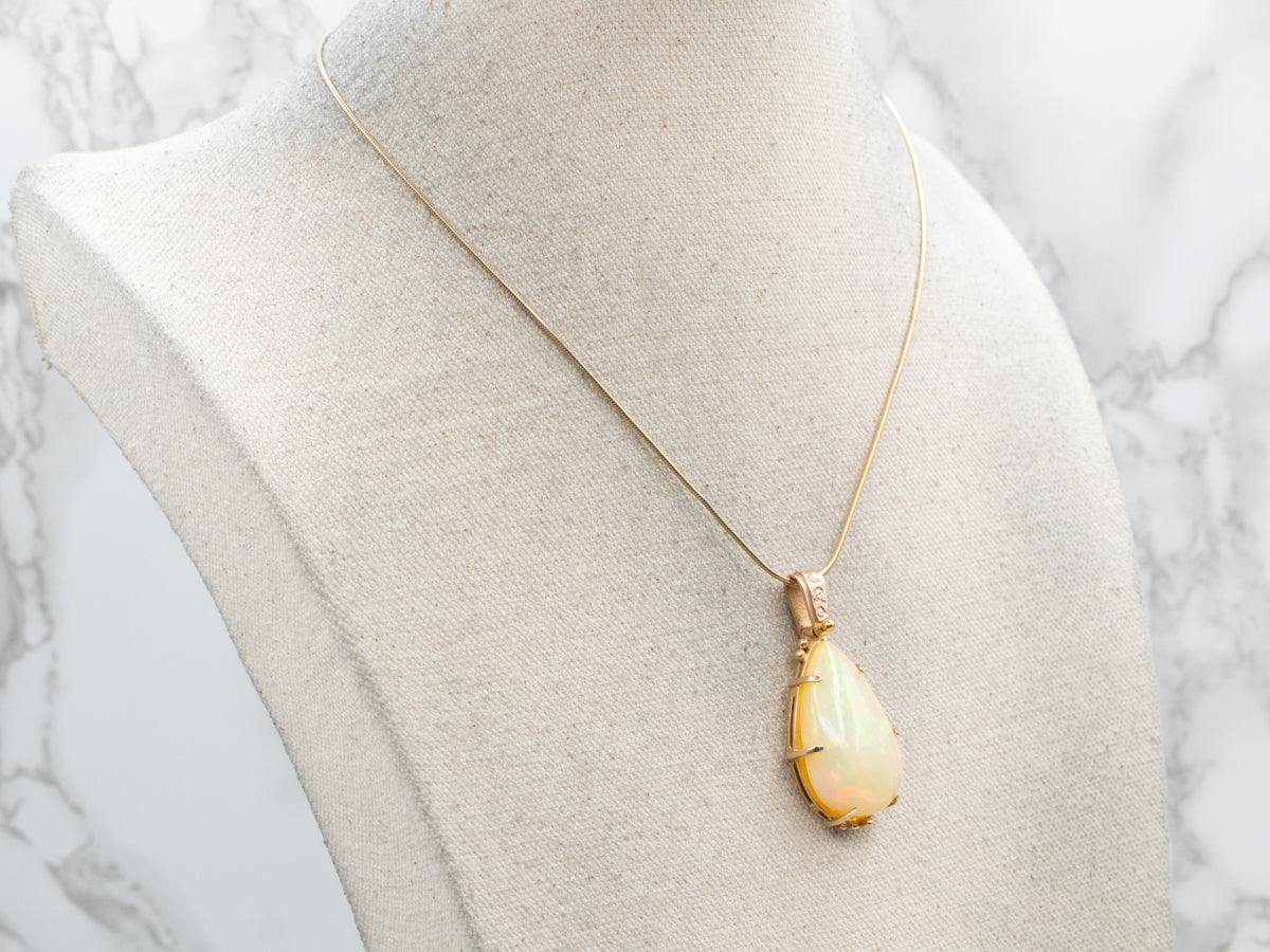 Huge Ethiopian Opal Pendant with Decorative Upcycled Bail