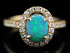 18K Yellow Gold Black Opal Oval and Diamond Halo Ring