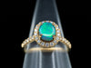 18K Yellow Gold Black Opal Oval and Diamond Halo Ring