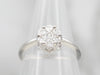 Modern White Gold Diamond Flower Engagement Ring