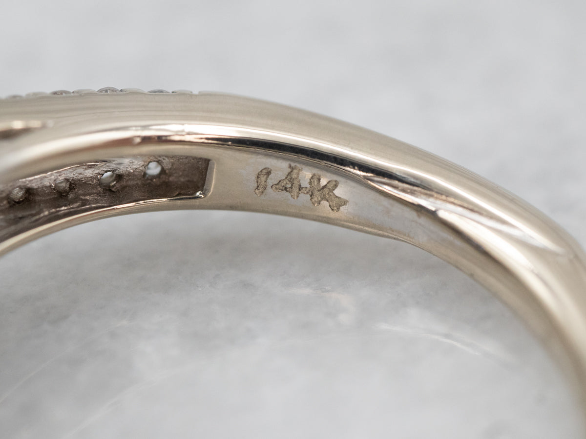 Modern Sapphire and Diamond Halo Ring