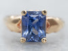 Sophisticated Yellow Gold and Blue Sapphire Solitaire Engagement Ring