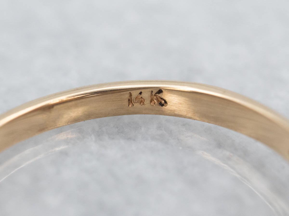 Sophisticated Yellow Gold and Blue Sapphire Solitaire Engagement Ring