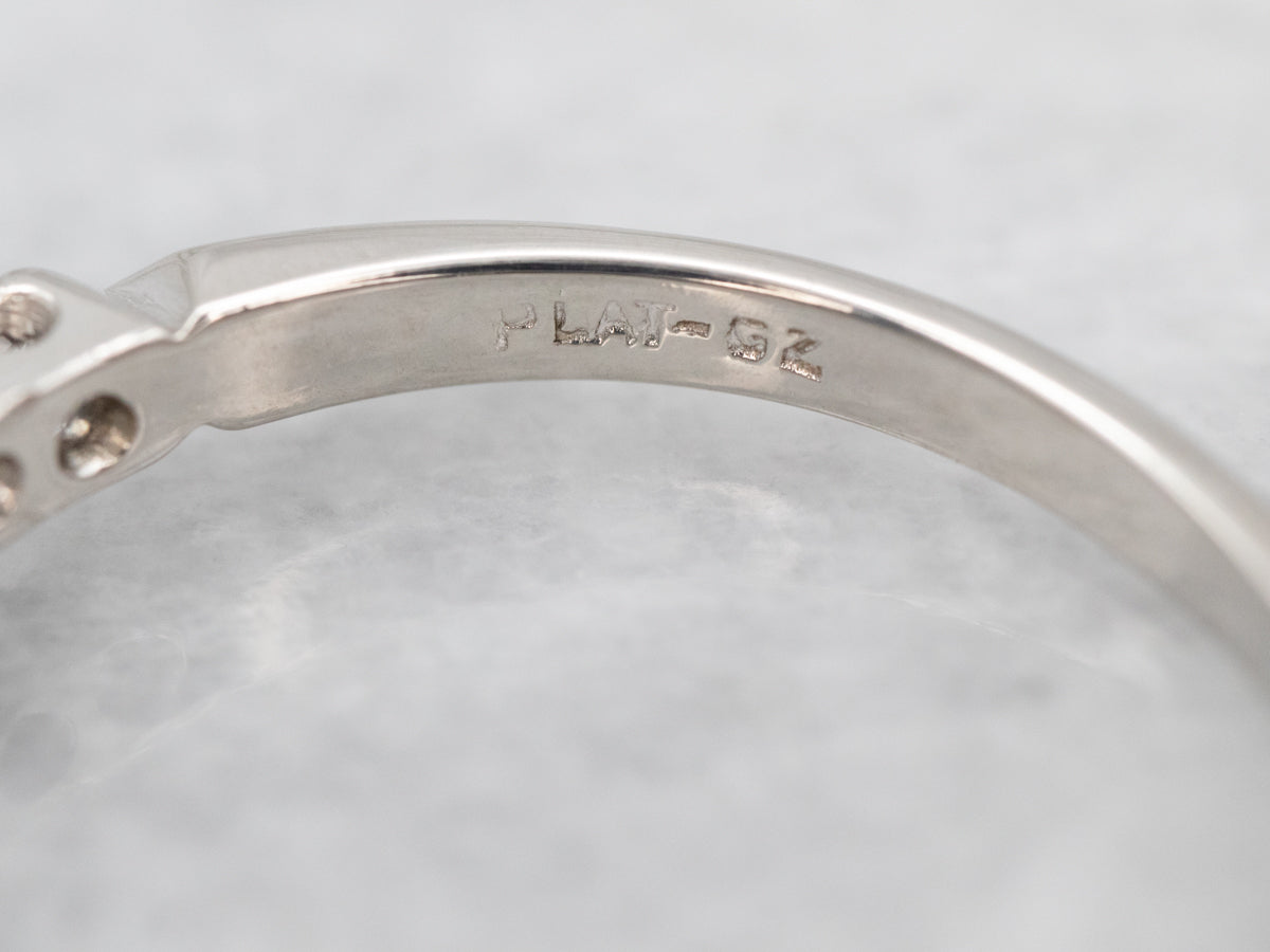 Retro Platinum and Diamond Encrusted Engagement Ring