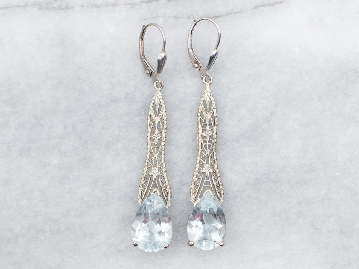 Pendientes colgantes de filigrana con topacio azul y oro blanco