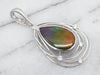 Lovely Ammolite Pendant with Floating Diamond Accents