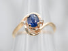 Gold Sapphire Bypass Ring with Diamond Accents