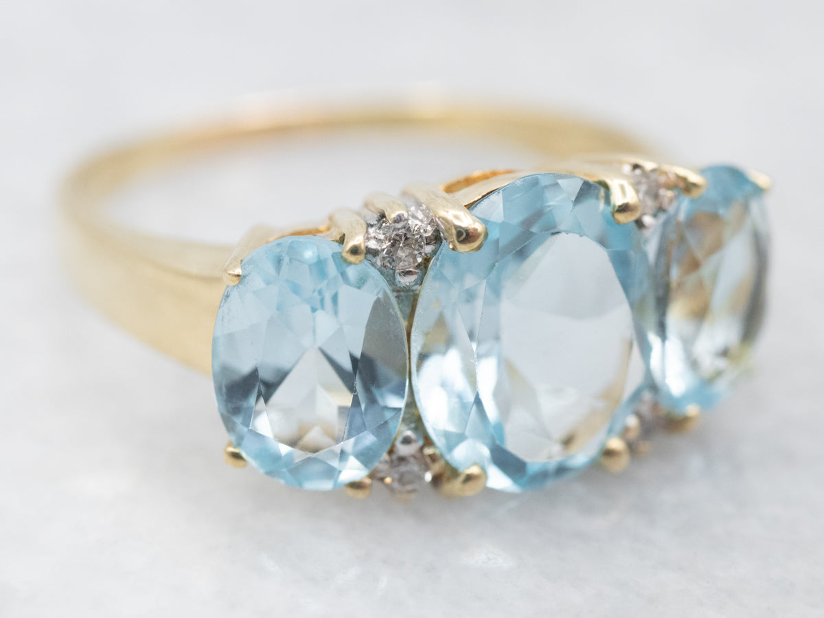 Blue Topaz Three Stone Ring with Diamond Accents