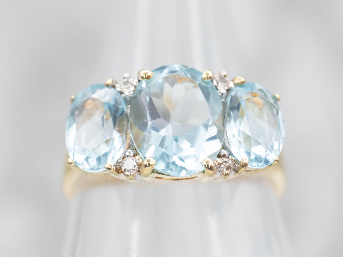 Blue Topaz Three Stone Ring with Diamond Accents