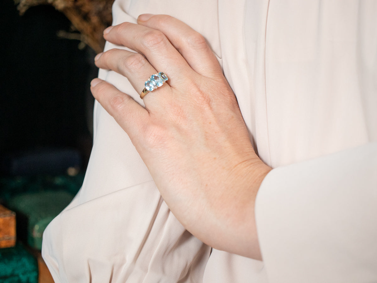 Blue Topaz Three Stone Ring with Diamond Accents