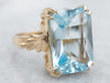 Emerald Cut Blue Topaz Solitaire Ring