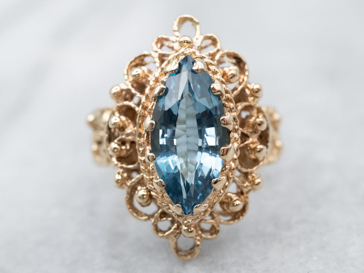 Gold Halo Blue Topaz Filigree Ring