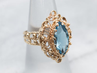 Gold Halo Blue Topaz Filigree Ring