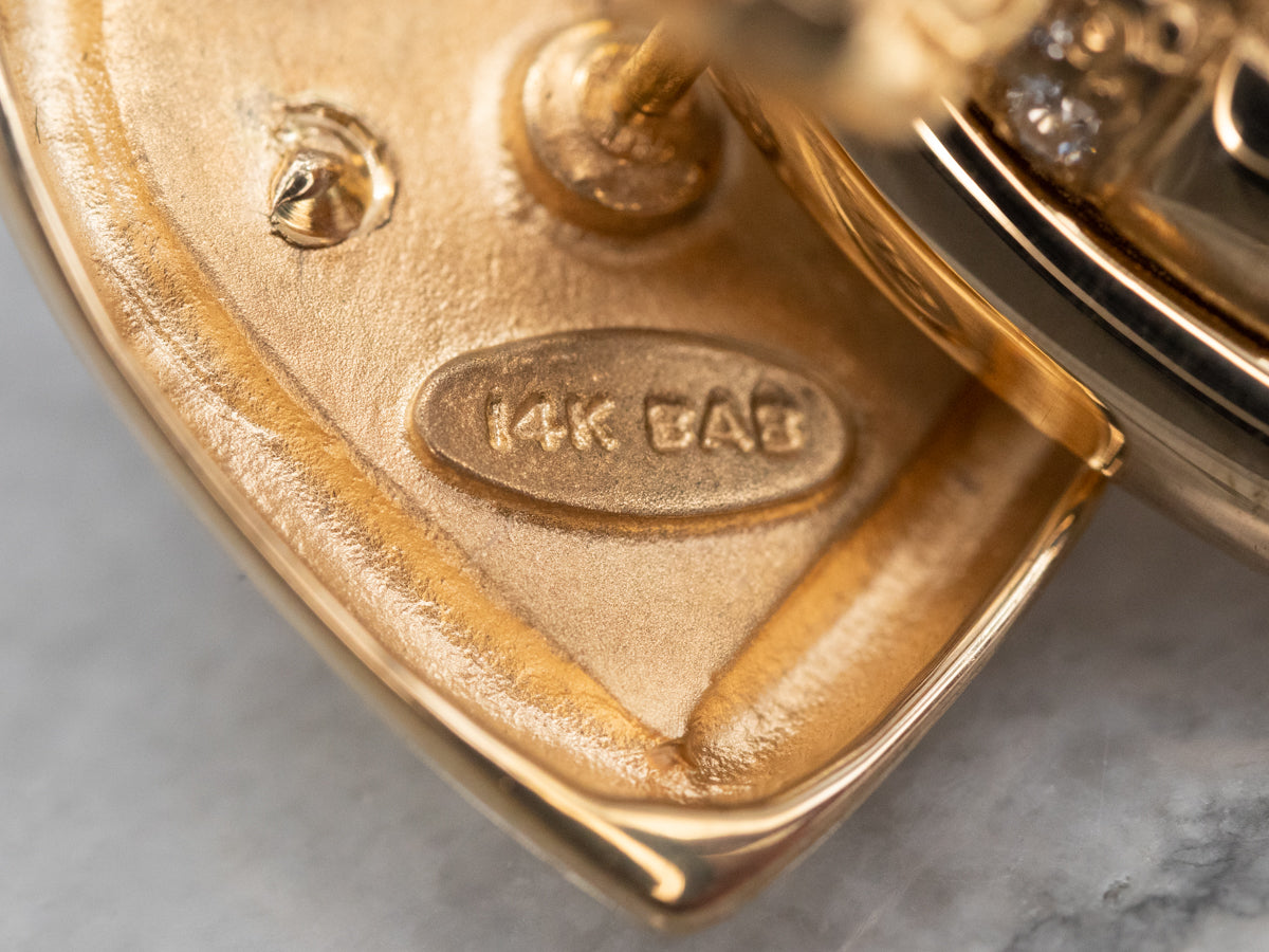 Aretes de corazón centelleantes en oro amarillo con diamantes