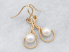 Pretty Yellow Gold Pearl Twisted Drop Earring