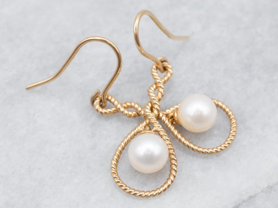 Pretty Yellow Gold Pearl Twisted Drop Earring
