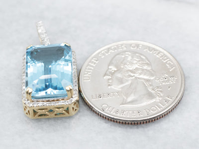 Blue Topaz and Diamond Halo Pendant