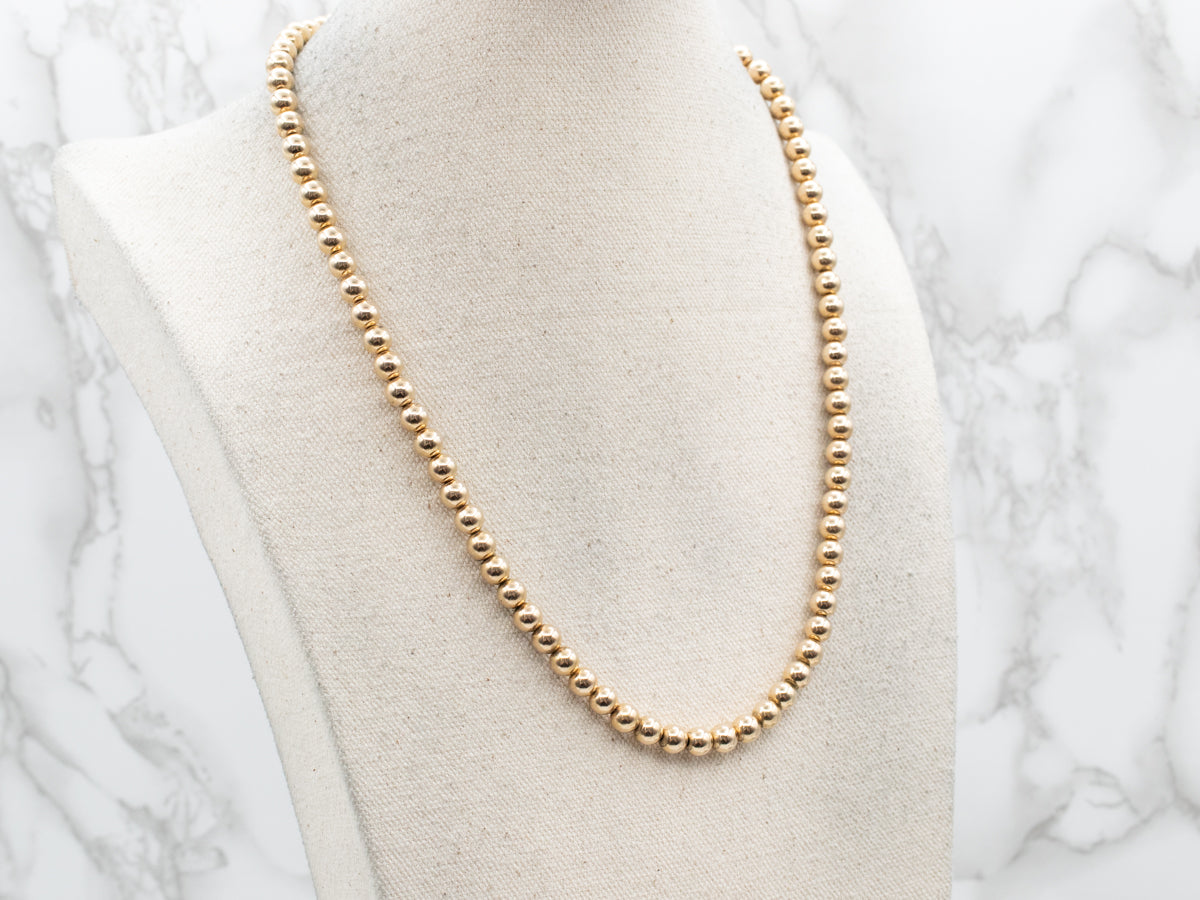 Vintage 14-Karat Yellow Gold Beaded Ball