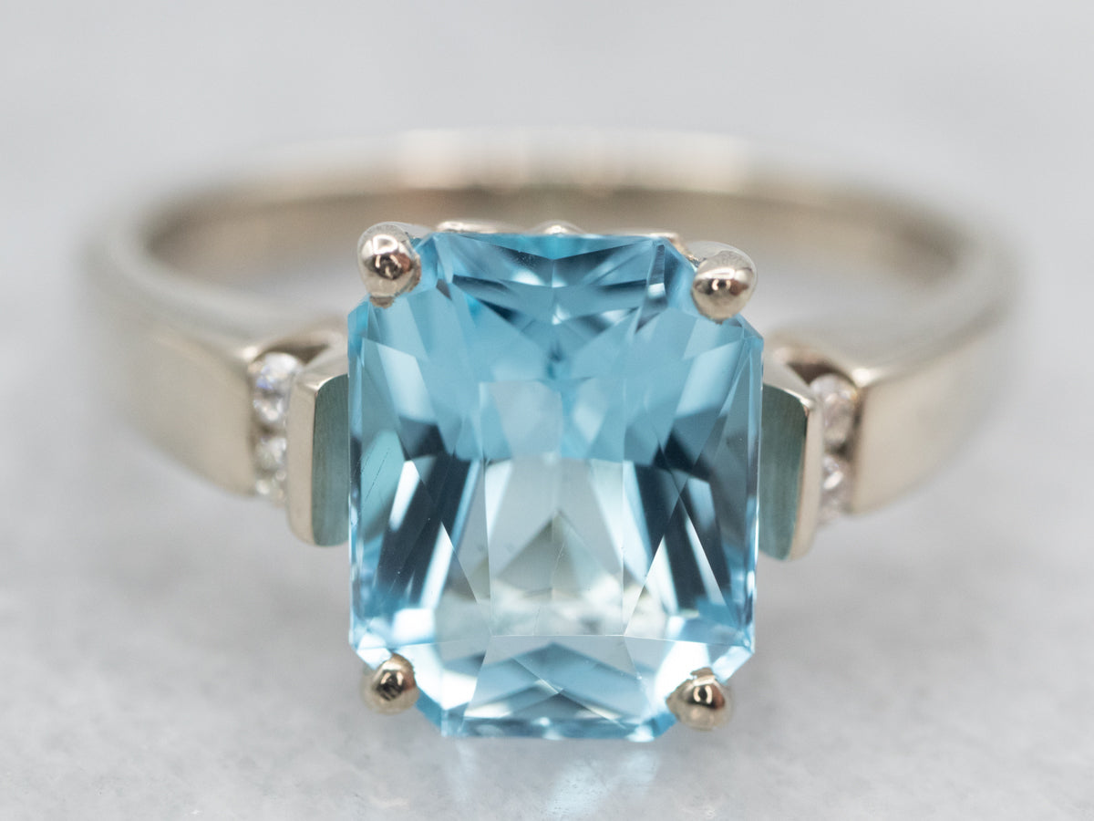 Twinkling White Gold Blue Topaz and Diamond Ring