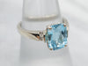 Twinkling White Gold Blue Topaz and Diamond Ring