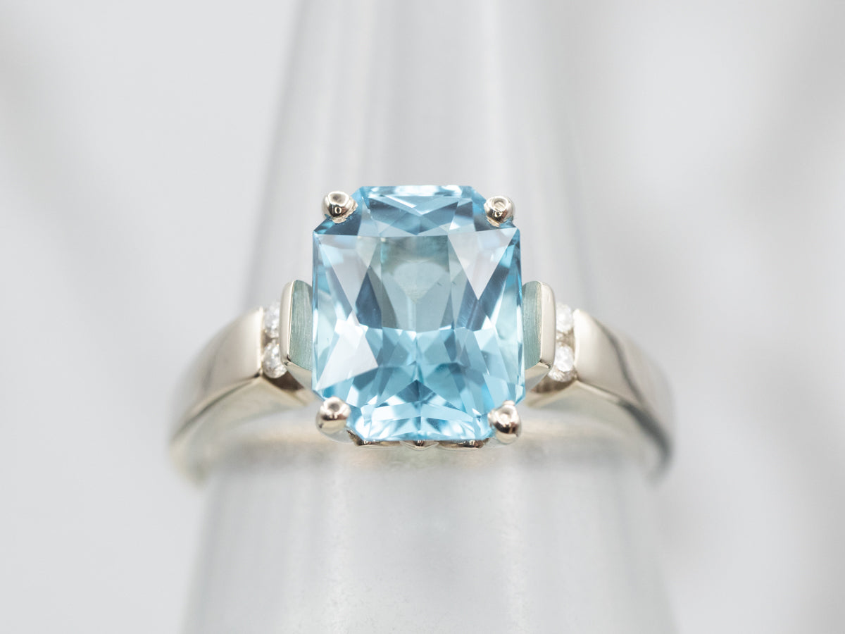 Twinkling White Gold Blue Topaz and Diamond Ring